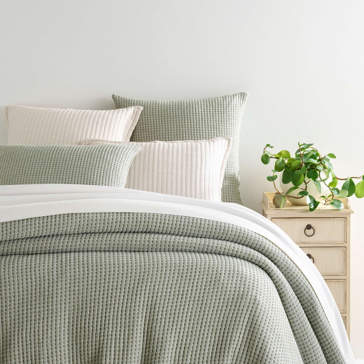 Pick Stitch Evergreen Matelasse Coverlet styled with white bedding. Styled view. 