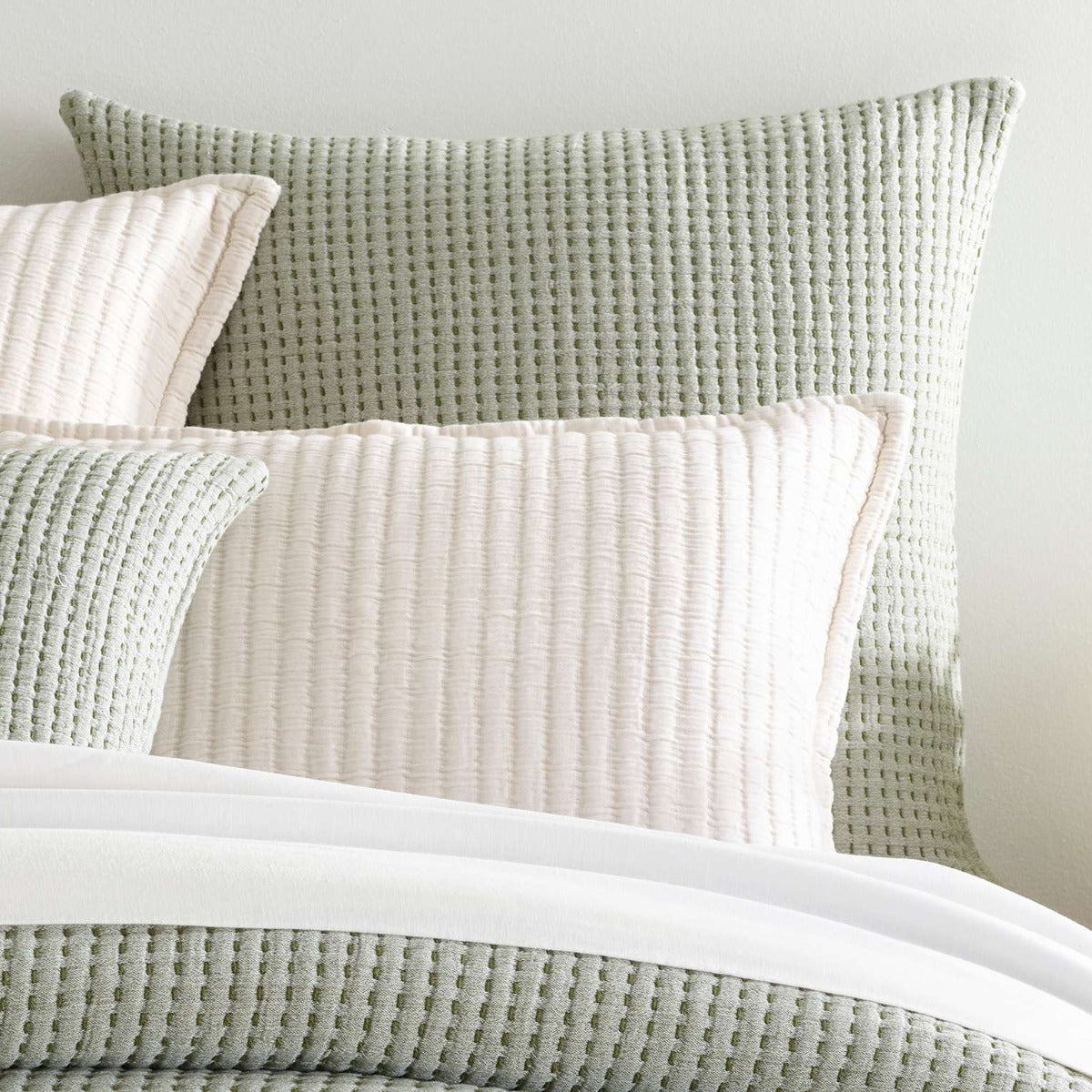 Pick Stitch Evergreen Matelasse Sham styled with white bedding. Styled view. 