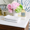 Rectangle Marble Tray - Medium styled with florals and soap in a bathroom. Styled view. 