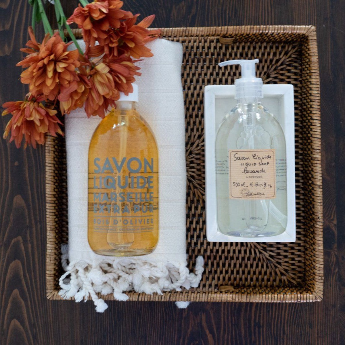 Rectangle Marble Tray - Small styled with soap and towel in a rattan tray. Styled view.