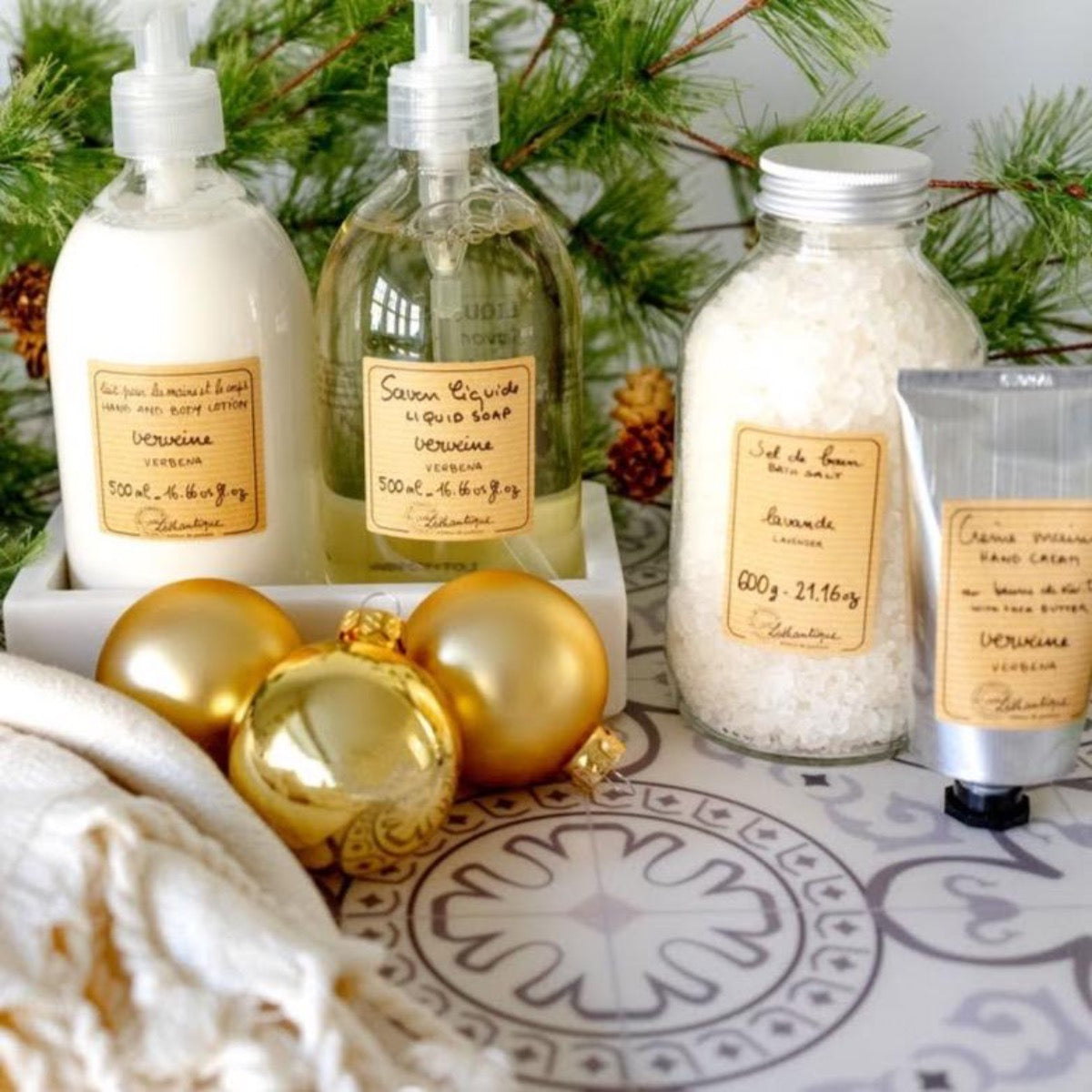 Rectangle Marble Tray - Small styled with soap and lotions with gold ornaments. Styled view.