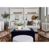 Stephen Sofa styled with brown and blue decor in a neutral living room. Styled view. 