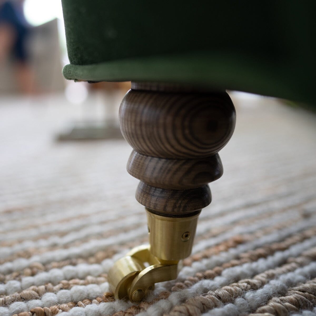 Stephen Sofa caster foot. Close-up detail view.