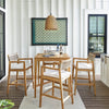 Beehive Outdoor Pendant - Small styled above a neutral dining set. Styled view.