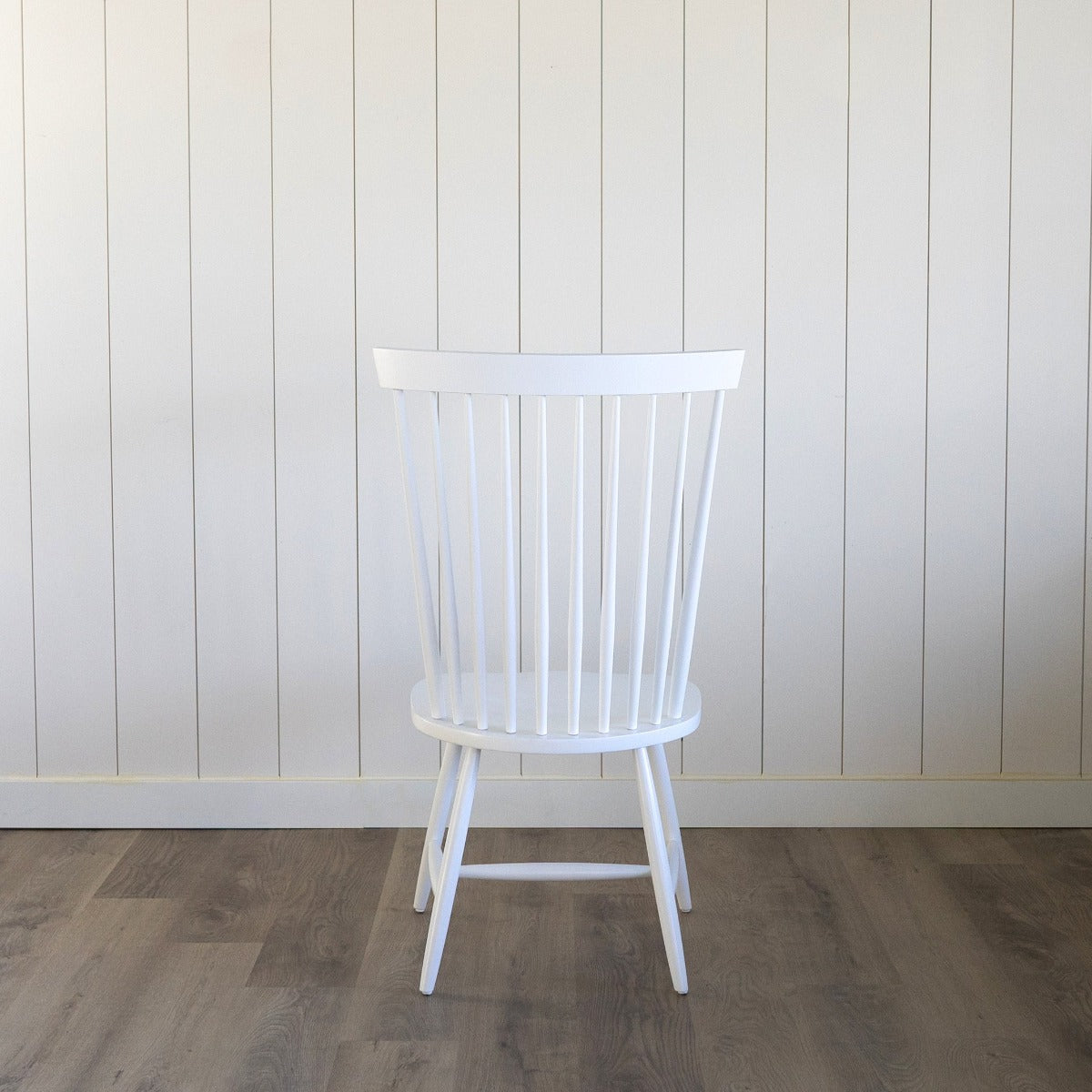 Whitaker Dining Chair in Opaque White. Front view.