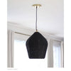 Georgian Pendant styled in a white room with large windows. Styled view.